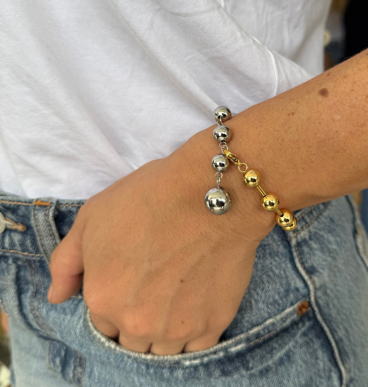Pulsera doble tono bolas infinito.