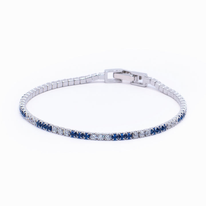 Pulsera tenis circones transparentes y circones azules.