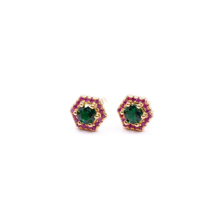 Pendientes halo circones verde y fucsia alrededor.